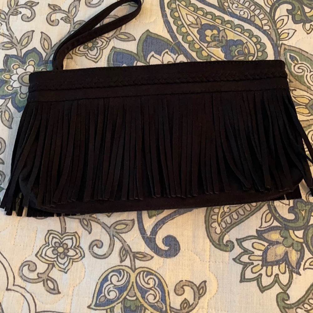 Express faux suede fringe clutch w/dust bag.